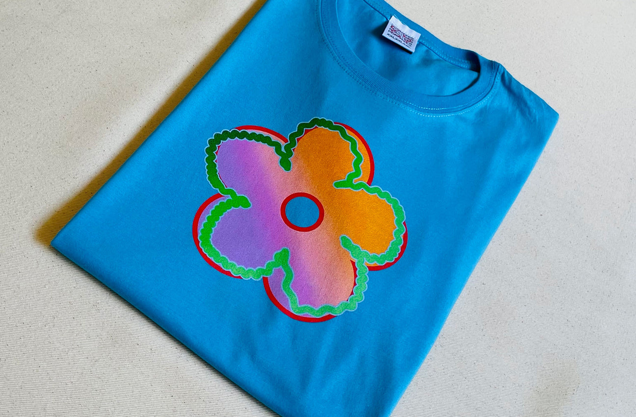 SUNSET FLOWER ELECTRIC BLUE TEE